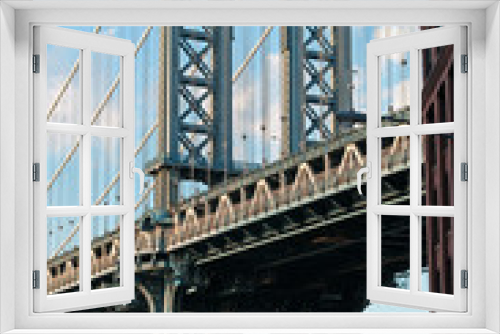 Fototapeta Naklejka Na Ścianę Okno 3D - Il ponte di Manhattan visto dal quartiere di Dumbo, Brooklyn, New York