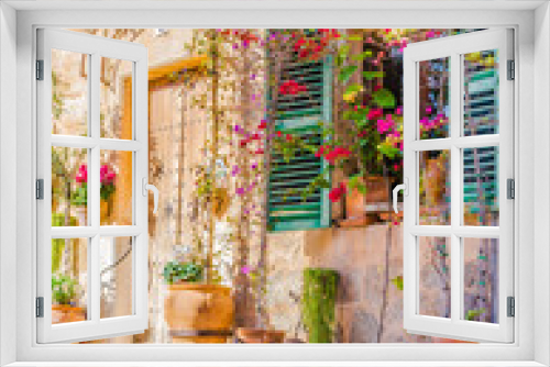 Fototapeta Naklejka Na Ścianę Okno 3D - Romantic view of a old mediterranean village house