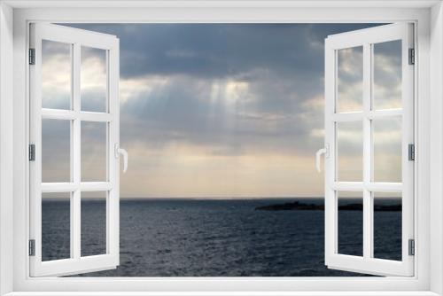 Fototapeta Naklejka Na Ścianę Okno 3D - Sonnenstrahlen über dem Meer in Schweden