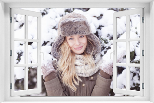 Attractive young woman in wintertime outdoor