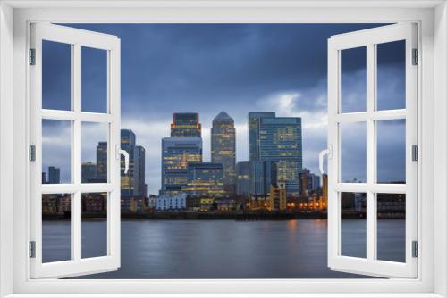 Fototapeta Naklejka Na Ścianę Okno 3D - Canary Wharf, the leading financial district of London taken from Greenwich at blue hour - London, UK