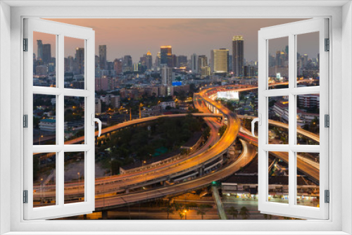 Fototapeta Naklejka Na Ścianę Okno 3D - Aerial view city downtown background with highway intersection during twilight