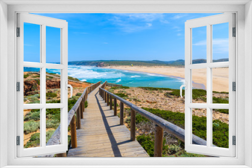 Fototapeta Naklejka Na Ścianę Okno 3D - Wooden walkway to Praia do Bordeira beach and beautiful blue sea view, Algarve region, Portugal