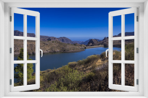 Fototapeta Naklejka Na Ścianę Okno 3D - Stausee mit blauem Wasser in den Bergen auf Gran Canaria
