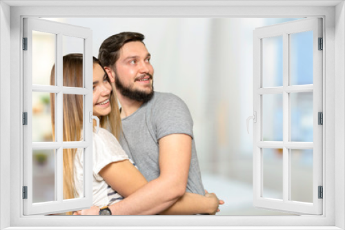 Cheerful young couple standing