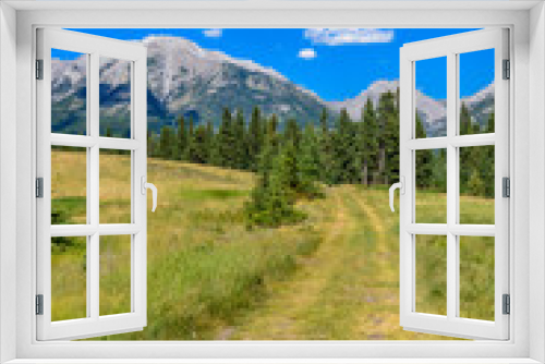 Fototapeta Naklejka Na Ścianę Okno 3D - Beautiful landscape of valley in Alpine mountains, small trail, hike root, majestic picturesque view in sunny day