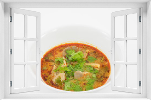 Fototapeta Naklejka Na Ścianę Okno 3D - The tasty spicy pork tom yum soup (hot and sour soup) in white ceramic bowl, homemade Thai food.