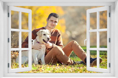 Fototapeta Naklejka Na Ścianę Okno 3D - Man with labrador on autumn nature