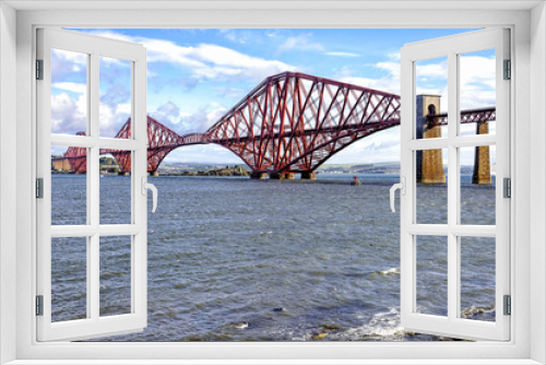 Fototapeta Naklejka Na Ścianę Okno 3D - View of Forth Bridge, Scotland, UK. Fort Bridge is a cantilever railway bridge considered an iconic structure and a symbol of Scotland. It is a UNESCO World Heritage Site.