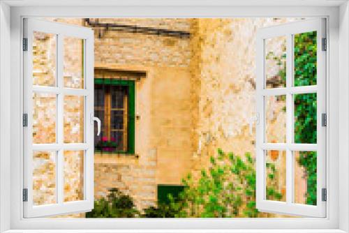 Fototapeta Naklejka Na Ścianę Okno 3D - Innenhof Mediterran Häuser mit Stein Fassaden