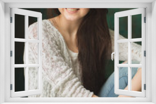 Portrait of young lady in photostudio interior