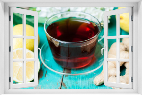 Fototapeta Naklejka Na Ścianę Okno 3D - Cup of tea with lemon and honey on wooden background