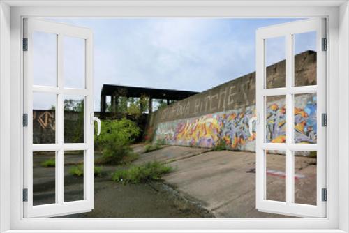 Fototapeta Naklejka Na Ścianę Okno 3D - Urban ghetto cement painted wall outdoors - landscape color photo
