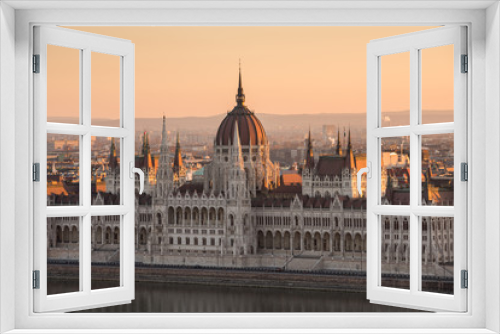 Illuminated Hungarian Parliament Building in Budapest, Hungary at Sunrise