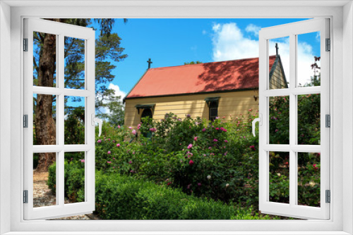 Fototapeta Naklejka Na Ścianę Okno 3D - Old church in cottage garden