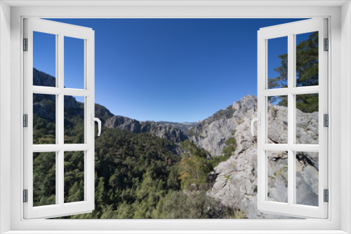 Fototapeta Naklejka Na Ścianę Okno 3D - Beautiful panoramic mountain scenery in the summer on a sunny day.