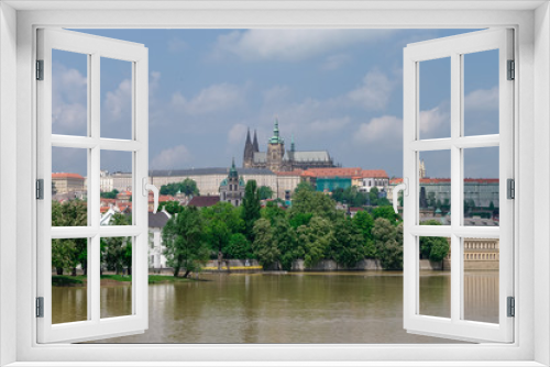 Fototapeta Naklejka Na Ścianę Okno 3D - View of colorful old town, Prague castle and St. Vitus Cathedral with river Vltava, Czech Republic