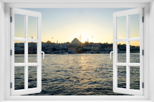 Fototapeta Naklejka Na Ścianę Okno 3D - New Mosque view from the Bosphorus at sunset