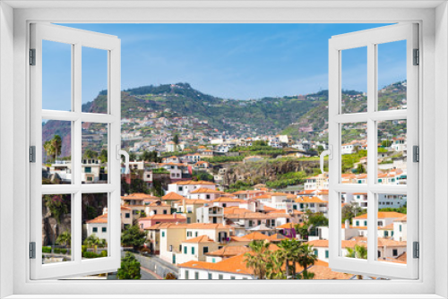 Panoramic view of tranquil hillside town