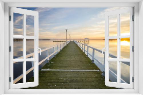 Fototapeta Naklejka Na Ścianę Okno 3D - wooden, white pier on the bay at sunset