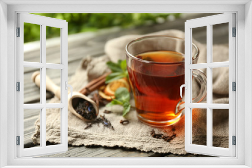 Fototapeta Naklejka Na Ścianę Okno 3D - Cup of tea on wooden table