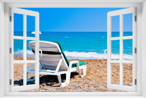 Fototapeta Naklejka Na Ścianę Okno 3D - A chaise-longue on the beach.