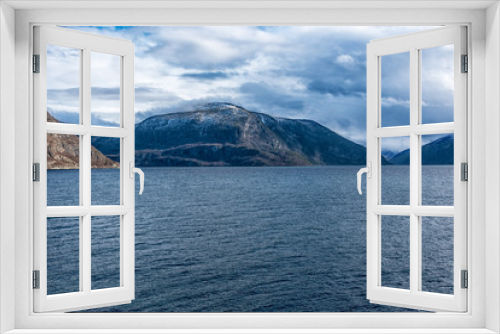 Fototapeta Naklejka Na Ścianę Okno 3D - view over fjord and mountains a beautiful spring day