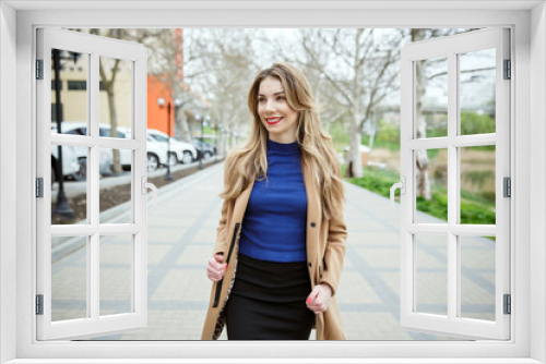 Young beautiful business woman, outdoors portrait