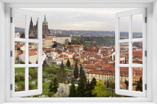 Fototapeta Naklejka Na Ścianę Okno 3D - pring Prague City with gothic Castle, green Nature and flowering Trees, Czech Republic