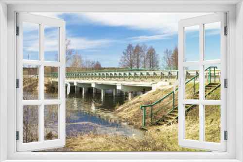 Fototapeta Naklejka Na Ścianę Okno 3D - Spring landscape with bridge through river