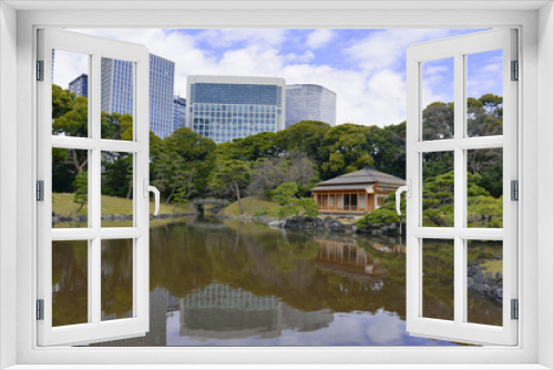 Fototapeta Naklejka Na Ścianę Okno 3D - Hamarikyu gardens in Tokyo Japan, a nice example of a traditional Japanese garden in an urban environment