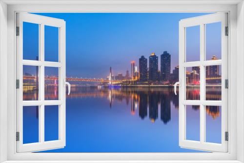 Fototapeta Naklejka Na Ścianę Okno 3D - Chongqing,China night cityscape at the Jialing River and Qianximen Bridge