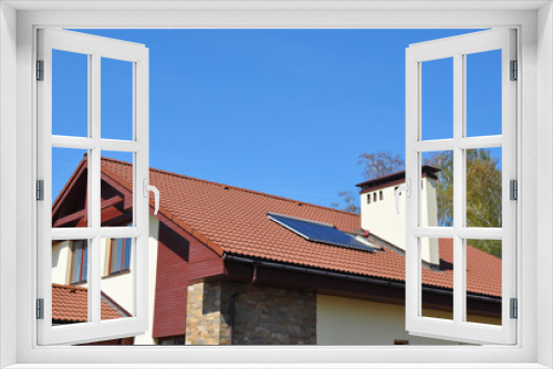 Fototapeta Naklejka Na Ścianę Okno 3D - Cozy house Roofing with Vacuum Solar Water Panel Heating, Solar Panels, Skylights Outdoor.