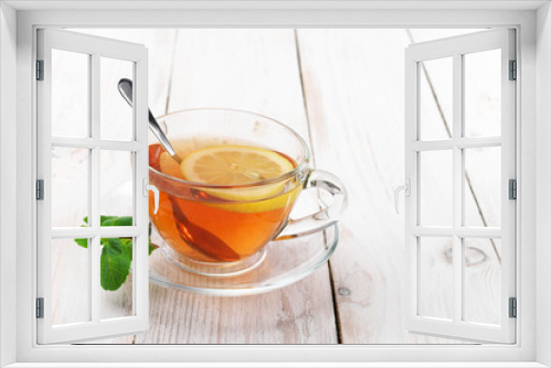 Fototapeta Naklejka Na Ścianę Okno 3D - Tea in glass cup