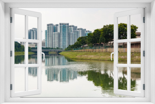 Fototapeta Naklejka Na Ścianę Okno 3D - typical Singapore highrise public housing estate with river in f