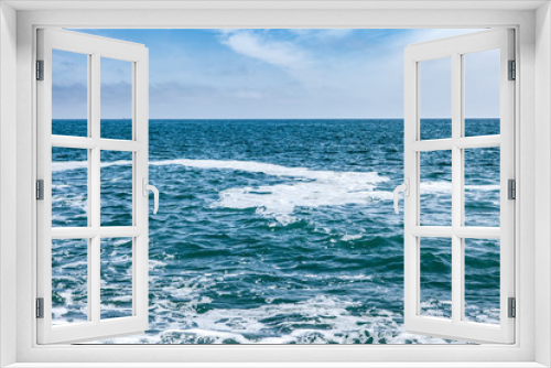 Fototapeta Naklejka Na Ścianę Okno 3D - Blue sea with waves and sky with clouds