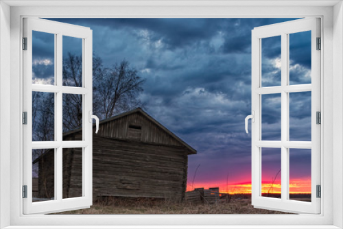 Fototapeta Naklejka Na Ścianę Okno 3D - Sunset Behind An Old Barn House