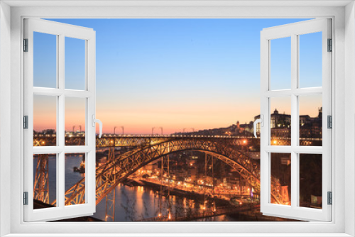 Fototapeta Naklejka Na Ścianę Okno 3D - evening view  of downtown Porto and bridge Dom Luis, Portugal