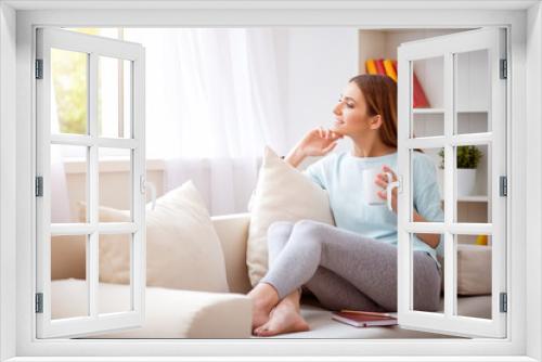 Pleasant beautiful woman resting on the couch 