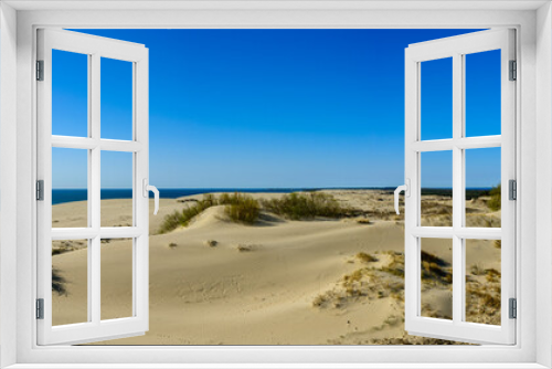 Fototapeta Naklejka Na Ścianę Okno 3D - Panorama of sandy dunes and blue sky in the spring morning. Efa Height., Curonian Spit National Park, Russia.