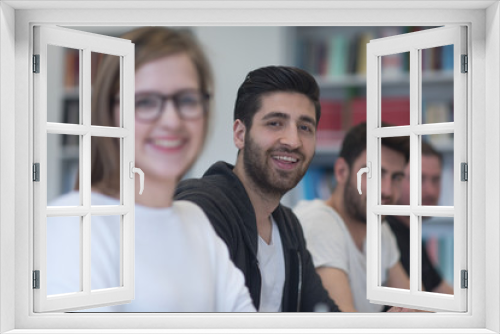 group of students study together in classroom