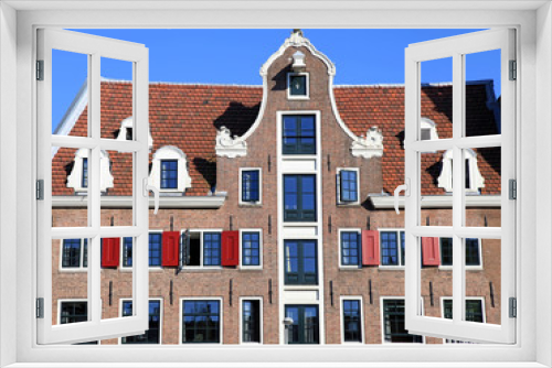 Fototapeta Naklejka Na Ścianę Okno 3D - Traditional dutch medieval building in Amsterdam, Netherlands