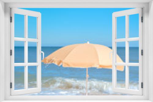 Fototapeta Naklejka Na Ścianę Okno 3D - Sun parasol on the sandy beach ocean sky