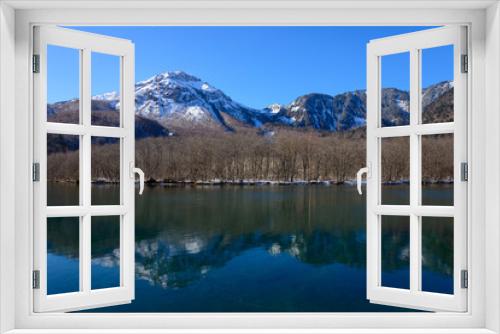 Fototapeta Naklejka Na Ścianę Okno 3D - Lake Taisho and Mt.Yake in winter in Kamikochi, Nagano, Japan