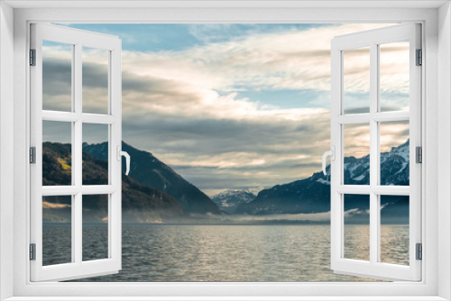 Fototapeta Naklejka Na Ścianę Okno 3D - The Swiss Alps and the lake in the early morning