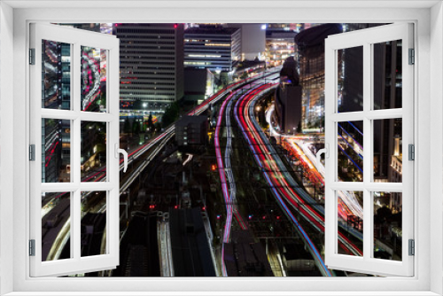 Fototapeta Naklejka Na Ścianę Okno 3D - 東京駅の真上から見た、電車の光跡