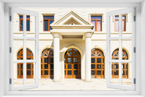 Fototapeta Naklejka Na Ścianę Okno 3D - Exterior of a Town House with column.
