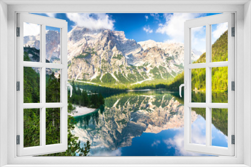 Fototapeta Naklejka Na Ścianę Okno 3D - Lake Braies also known as Lago di Braies. The lake is surrounded by the mountains which are reflected in the water.1st point of the trekking route Alta Via 1, The Dolomites, Alps, South Tyrol, Italy.