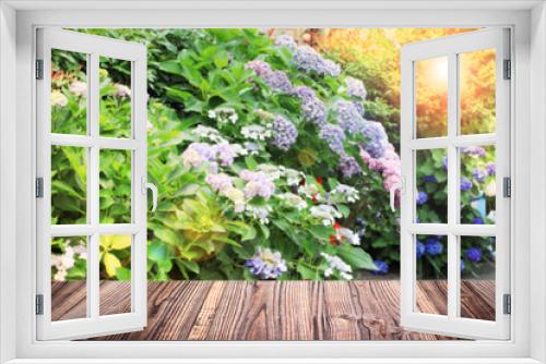 Fototapeta Naklejka Na Ścianę Okno 3D - Wooden empty plate with color hydrangea flowers blur background