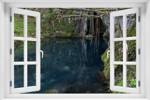 Fototapeta Naklejka Na Ścianę Okno 3D - The river which rises from cave